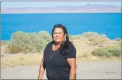  ?? SAM METZ — THE ASSOCIATED PRESS ?? Janet Davis, an enrolled member of the Pyramid Lake Paiute Tribe, stands alongside Pyramid Lake between Nixon, Nev. and Sutcliffe, Nev.