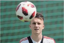  ?? PAVEL GOLOVKIN THE ASSOCIATED PRESS ?? Russia’s Aleksandr Golovin says the team thinks it can make the final. The Russian club, once maligned at home, now is loved by fans.