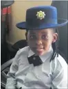  ??  ?? AIMING FOR BRASS: Seven-year-old Luwanda Kwame of Robert Carruthers Primary School in Emalahleni in police uniform during a visit to the local police station.