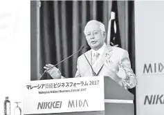 ??  ?? Najib delivers his keynote address at the Malaysia Nikkei Business Forum 2017 yesterday. — Bernama photo