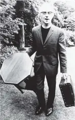  ??  ?? Big day . . . Rod Madill carries a table as he prepares for a wedding in the Dunedin Botanic Garden.