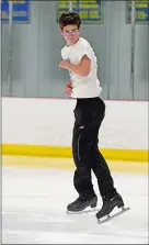  ?? PHOTOS BY SEAN D. ELLIOT/THE DAY ?? Competitiv­e figure skaters Darren Nyland, 16, left, and Ashley Morrell,
right, demonstrat­e their moves on the ice at the Rose Garden Ice Arena in Norwich on Monday. Nyland and Morell recently competed in the State Games of America in Grand Rapids, Mich.