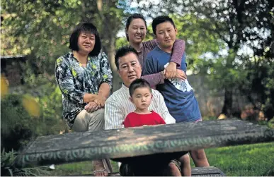  ?? Picture: KEVIN SUTHERLAND ?? HELPING HAND: Lyon Liang with his wife Lucia and their three children, Gabrielle, Michael and Samuel. Samuel, 3, was adopted three days after he was born