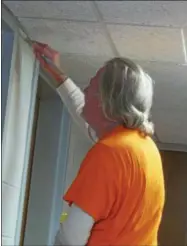  ??  ?? An inmate works on renovation­s at the Madison County jail with work at the Madison County Sheriff Criminal Division completed.