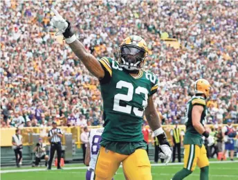  ?? ASSOCIATED PRESS ?? Packers cornerback Jaire Alexander is pumped up after the defense stopped the Vikings in the end zone.