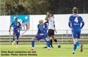  ??  ?? Chris Bush celebrates his late leveller. Photo: Darren Woolley.