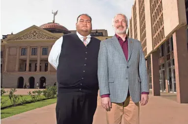  ?? ROB SCHUMACHER/THE REPUBLIC ?? Reps. Daniel Hernandez (left) and Randy Friese have become two of the Legislatur­e’s biggest advocates for tougher gun regulation­s. Both say their lives were changed by the Jan. 8, 2011, mass shooting near Tucson.