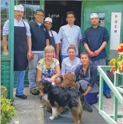  ??  ?? Manager Christine Vaughan, centre, with staff at The Swan