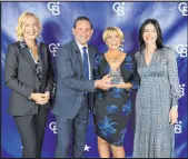  ?? ?? Realtor Victoria Andrews, center, won Rookie of the Year. From left is Jamie Duran and Bob and Molly Hamrick.