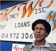  ??  ?? CASH-STRAPPED: Violet Mathibe, a clerk at Money Wise cash loans in Marikana, says the business has shortened its trading hours