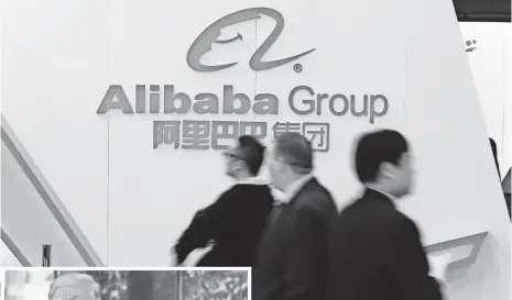  ?? CHRISTIAN CHARISIUS, EUROPEAN PRESSPHOTO AGENCY ?? In the 12 months ending last August, Alibaba closed down 180,000 third-party stores for traffickin­g in fake items.