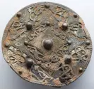  ?? ?? How the Cheddar brooch looked when it was found. Photograph: Museum of Somerset