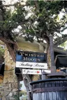  ??  ?? The Twisted Roots tasting room in Carmel Valley sits just inside the entrance to Lyon’s Head Gallery.