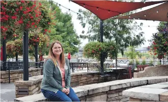  ??  ?? Odell Brewing Co.’s Kailey Bowser says the brewery’s cool patio is hopping in warm weather.