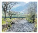  ??  ?? The River Derwent, near Seathwaite, in Cumbria, which has completely dried up