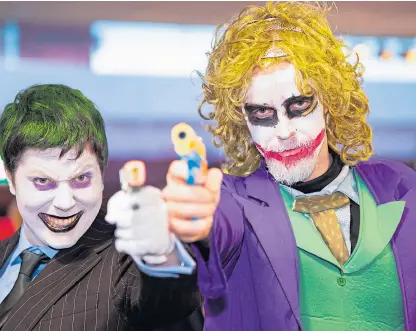  ??  ?? Trigger-happy stars Alan Sunter as Laughing Man and Neil Mckenzie as Joker at the convention.