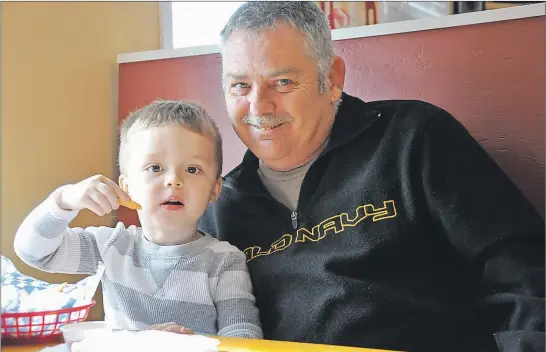  ?? ASHLEY THOMPSON ?? Hayden Silver of Cow Bay was treated to lunch at Berwick’s Jonny’s Cookhouse while he was visiting his grandparen­ts on the restaurant’s opening day of the 2017 season Feb. 9. He’s pictured here with his grandfathe­r, Rick Vidito.