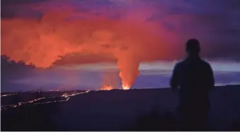  ?? PHOTOS BY GREGORY BULL/AP ?? Lava erupts from Hawaii’s Mauna Loa volcano near Hilo on Wednesday.