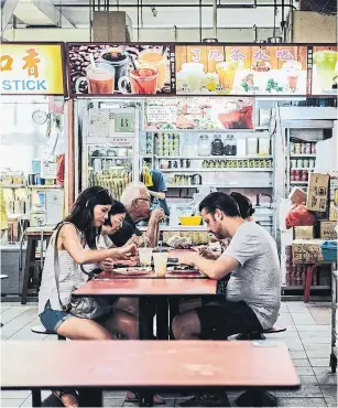  ?? REBECCA TOH THE NEW YORK TIMES ?? Malaysians say that Singapore’s hawker food centres are too sterile to be representa­tive of the region’s street cuisine. Two of them, however, have achieved Michelin stars.