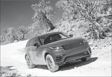  ?? Jaguar Land Rover ?? THE 2018 Range Rover Velar feels light and nimble and is easy to drive. Its front seats are very comfortabl­e.