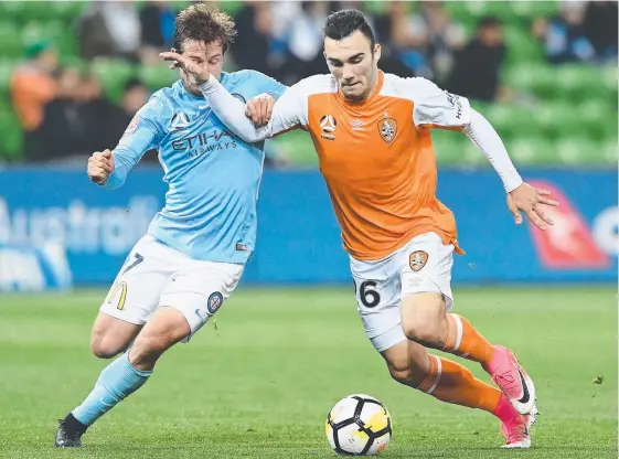  ?? Picture: GETTY IMAGES ?? Nick D'Agostino (right) is set to miss the Roar’s A-League clash against Adelaide United due to an ankle injury.