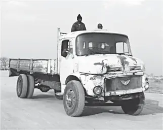  ??  ?? AN unregister­ed old truck rumbles along a Cowdray Park road in Bulawayo yesterday. Trucks like the one above are used for sand poaching in the area, a situation that has led to serious land degradatio­n while the deep open pits dug have become hazardous...