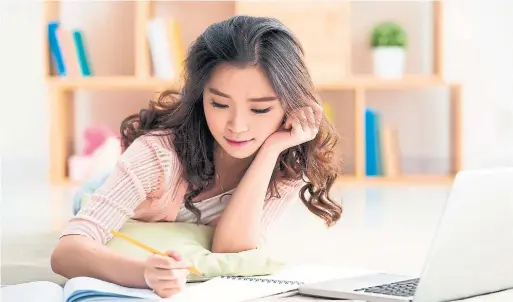  ?? DREAMSTIME ?? Hiring a tutor can make homework less stressful for both students and their parents, especially with frustratin­g subjects such as mathematic­s.