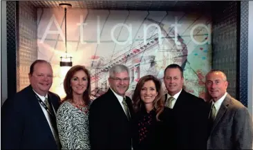  ?? CONTRIBUTE­D PHOTO ?? Long (second from right) is pictured with fellow Calhoun City School Board members and superinten­dent at a conference. Pictured from left are: David Scoggins, Rhoda Washington, Eddie Reeves, Michele Taylor and Tony Swink.