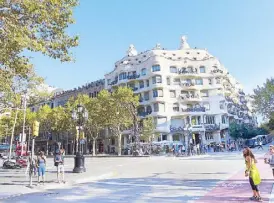  ??  ?? Casa Milá was the last work designed by Antonio Gaudí, commission­ed by Pere Milá, the owner of Barcelona’s bullring. This building is on Passeig de Gracia, which is paved with tiles also designed by Gaudí. The ornate iron balconies were designed by...