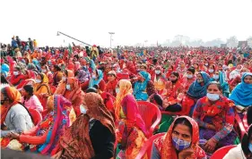  ?? AP FILE PHOTO/RAJESH KUMAR SINGH ?? Women gather to listen to Indian Prime Minister Narendra Modi as he lays the foundation stone of Major Dhyan Chand Sports University in Meerut, Uttar Pradesh.