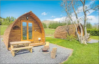  ??  ?? COMFY CAMPING: Enjoy the great outdoors from the warmth of a Wigwam Holidays insulated cabin