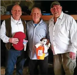  ?? PHOTO COURTESY OF THE FLUHARTY FAMILY ?? Scott Fluharty, in middle, stands with his brothers, Mark, left, and Kenny, right. Kenny and Mark both donated a kidney to Scott after he needed one transplant in 1996 and another in 2015.