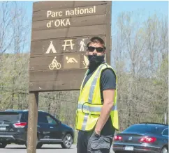  ?? Ryan Remiorz / The Cana dian Pres ?? Mohawks from Kanesatake block the entrance to Oka
provincial park Wednesday in Oka, Que.