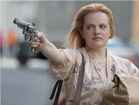  ??  ?? Elisabeth Moss gives a great performanc­e in “The Kitchen.”
