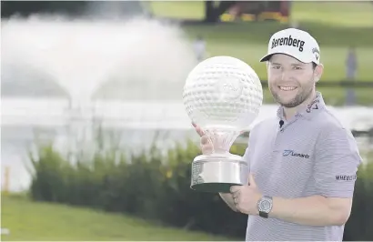  ?? Picture: Gallo Images ?? LOCAL IS LEKKER. Branden Grace broke South Africa’s 10-year title drought by winning the Nedbank Golf Challenge at Sun City on Sunday.