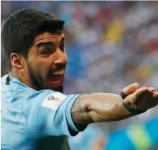  ?? AP PHOTO ?? MOVING FORWARD: Uruguay’s Luis Suarez hopes to cement a better World Cup legacy for himself, beginning with tomorrow’s quarterfin­al match against France.