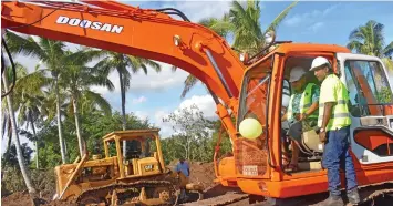  ?? Prime Minister Voreqe Bainimaram­a operating a digger at the groundbrea­king ceremony for the iTaukei Land Developmen­t Project in Saweni, Lautoka on June 28, 2017. ?? Photo: Charles Chambers