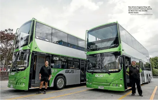  ?? PHOTOS: DOMINICO ZAPATA/STUFF ?? Bus drivers Eugene King, left, and Lynwood Peakman next to Go Bus’s two new doubledeck­er buses.