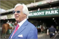  ?? MARY ALTAFFER / AP FILE ?? Trainer Bob Baffert walks out to the winner’s circle after the Brooklyn Invitation­al Stakes horse race at Belmont Park on June 9, 2018, in Elmont, N.Y. A retired New York State Supreme Court Justice has recommende­d a two-year suspension for trainer Bob Baffert after a New York Racing Associatio­n hearing.