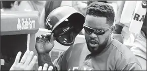  ??  ?? Calling it a career: In this July 17, 2016, file photo, Texas' Prince Fielder is greeted after scoring against the Chicago Cubs during a game in Chicago. A person with direct knowledge of the medical decision says Fielder will have to quit playing...