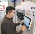  ?? Glenn Koenig Los Angeles Times ?? PROJECT MANAGER Jose Fuentes operates a metal 3-D printer at Morf3D, a 2year-old company in El Segundo.