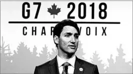  ?? MICHAEL REYNOLDS/EPA ?? Prime Minister Justin Trudeau declared that Canadians “will not be pushed around” as a top White House adviser suggested “there’s a special place in hell” for Canada’s leader.
