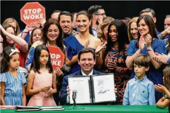  ?? Daniel A. Varela/Miami Heral ?? Florida Gov. Ron DeSantis attends an April signing ceremony in Hialeah Gardens for a state law to combat what he describes as the “woke ideology” of liberals and critical race theory.