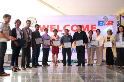  ?? Photo by Milo Brioso ?? TOP TAXPAYERS. Baguio’s top tax paying companies were honored by the Bureau of Internal Revenue hoping to encourage taxpayers and increase revenue for the city.