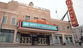  ?? MAX GERSH/THE COMMERCIAL APPEAL A.J. WOLFE/THE COMMERCIAL APPEAL ?? A message of wellness is displayed across the marque at the Orpheum in Downtown Memphis in late March.