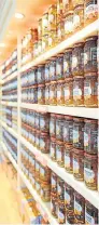  ??  ?? Top: Paul Grant, the managing director of Mackays. Above: Shelves full of Mackays’ Dundee orange marmalade and other jams and preserves at the group’s factory shop.