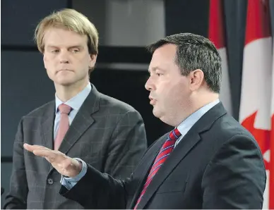  ?? SEAN KILPATRICK/ THE CANADIAN PRESS ?? Employment Minister Jason Kenney, shown with Citizenshi­p and Immigratio­n Minister Chris Alexander, is a stronger candidate for Tory leadership after his Temporary Foreign Worker Program overhaul, writes Michael Den Tandt.