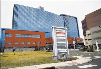  ?? Matthew Brown / Hearst Connecticu­t Media ?? A nurse at Stamford Hospital warns that the nurse-to-patient ratio is being challenged because many people are coming to the Emergency Department without symptoms.