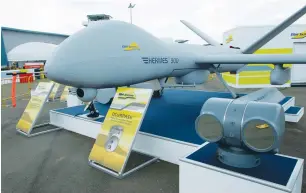  ?? (Reuters) ?? AN ELBIT SYSTEMS Hermes 900 medium-size, multi-payload drone is exhibited at the Singapore Airshow last week.