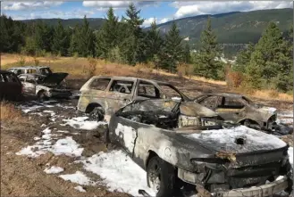  ?? West Kelowna Fire Rescue ?? Firefighti­ng foam covers the burned bodies of several vehicles and the ground around them after a fire Monday afternoon in the 3600 block of Gates Road in Glenrosa.West Kelowna Fire Rescue says the fire was...